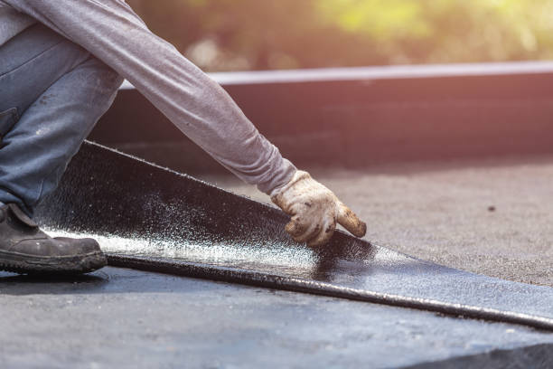 Professional Waterproofing technician working in Haviland, NY